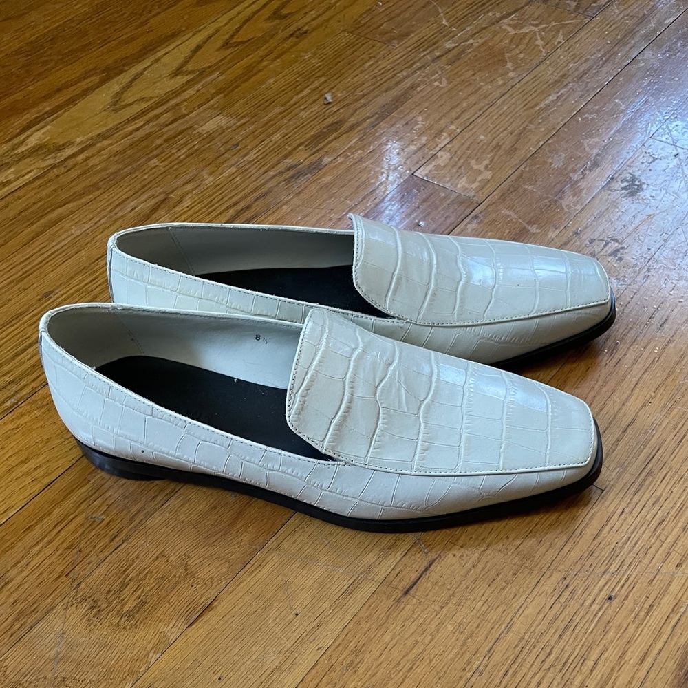 White leather loafers